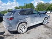 ✅ 2025 Mazda CX-50 Hybrid Premium Plus Package • VIN: 7MMVAAEW9SN127423 • Lot: 43322908. Wystawiony na IAAI z przebiegiem 2 928 mil. Bezpłatny archiwum sprzedaży aukcyjnych z USA i szczegółowy raport historii pojazdu na DreamBid. Zdjęcie 4.