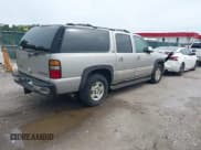 ✅ 2004 Chevrolet Suburban LT • VIN: 1GNFK16Z14J246188 • Lot: 43318864. Listed on IAAI with 220,765 mi. Free auction sales archive from the USA and detailed vehicle history report at DreamBid. Image 4.