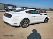 ✅ 2021 Ford Mustang EcoBoost • VIN: 1FA6P8TH0M5105142 • Lot: 84573175. Listed on Copart with 106,431 mi. Free auction sales archive from the USA and detailed vehicle history report at DreamBid. Image 3.