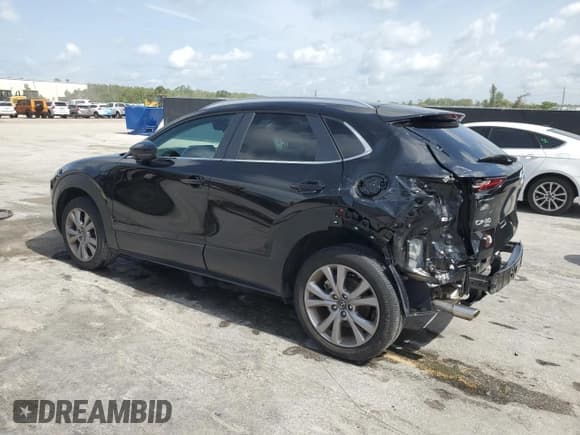 ✅ 2023 Mazda CX-30 S Carbon Edition • VIN: 3MVDMBCM2PM572015 • Lot: 60109135. Listed on Copart with 27,790 mi. Free auction sales archive from the USA and detailed vehicle history report at DreamBid. Image 2.