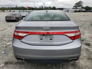 2015 Hyundai Azera z VIN KMHFG4JG1FA454362, wystawiony jako Copart lot #50897305 z przebiegiem 130 185 mil mil oraz Szkoda całkowita • Salvage title. Historia ofert i sprzedaży dostępna na DreamBid. Obrazek 6.