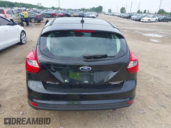 ✅ 2014 Ford Focus Titanium • VIN: 1FADP3N25EL194433 • Lot: 42512912. Listed on IAAI with 105,355 mi. Free auction sales archive from the USA and detailed vehicle history report at DreamBid. Image 16.