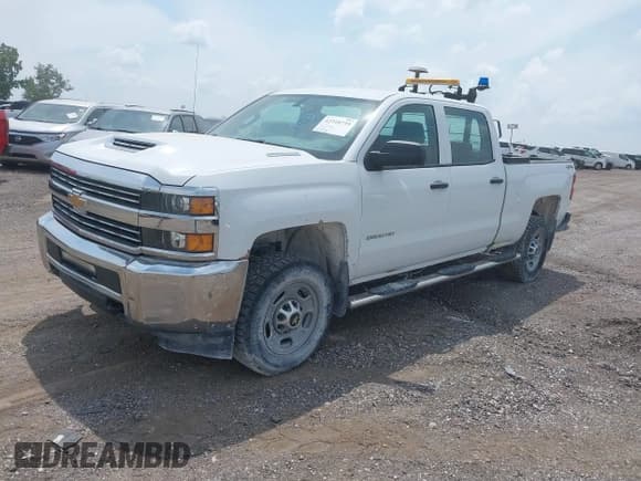 ✅ 2017 Chevrolet Silverado 2500HD Work Truck • VIN: 1GC1KUEY0HF217335 • Lot: 42310735. Listed on IAAI with 107,781 mi. Free auction sales archive from the USA and detailed vehicle history report at DreamBid. Image 2.
