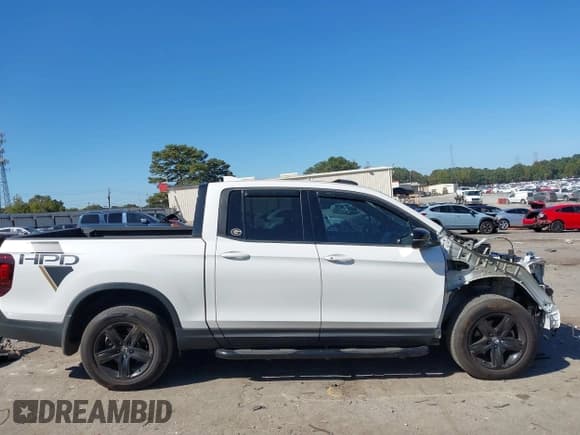 ✅ 2021 Honda Ridgeline Black Edition • VIN: 5FPYK3F89MB010925 • Lot: 43403500. Listed on IAAI with 37,778 mi. Free auction sales archive from the USA and detailed vehicle history report at DreamBid. Image 14.