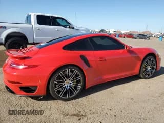 ✅ 2015 Porsche 911 Turbo S • VIN: WP0AD2A9XFS166153 • Lot: 49815853. Wystawiony na Copart z przebiegiem 20 184 mil. Bezpłatny archiwum sprzedaży aukcyjnych z USA i szczegółowy raport historii pojazdu na DreamBid. Zdjęcie 3.