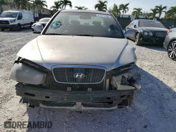 2003 Hyundai Elantra GLS z VIN KMHDN45D33U536214, wystawiony jako Copart lot #81979704 z przebiegiem 157 515 mil mil oraz Szkoda całkowita • Salvage title. Historia ofert i sprzedaży dostępna na DreamBid. Obrazek 5.