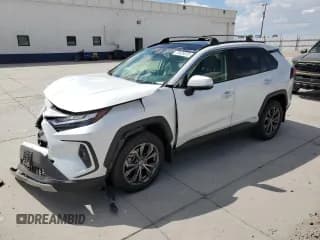 ✅ 2023 Toyota RAV4 Hybrid Limited • VIN: JTMD6RFV4PD097715 • Lot: 70426325. Listed on Copart with 31,811 mi. Free auction sales archive from the USA and detailed vehicle history report at DreamBid. Image 1.