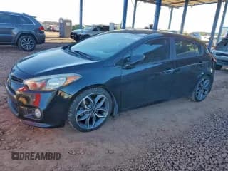 ✅ 2015 Kia Forte SX • VIN: KNAFZ5A30F5282879 • Lot: 94506535. Listed on Copart with 144,636 mi. Free auction sales archive from the USA and detailed vehicle history report at DreamBid. Image 1.