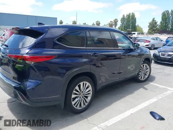 ✅ 2023 Toyota Highlander Hybrid Platinum • VIN: 5TDEBRCH4PS596582 • Lot: 42370587. Listed on IAAI with 12,144 mi. Free auction sales archive from the USA and detailed vehicle history report at DreamBid. Image 4.