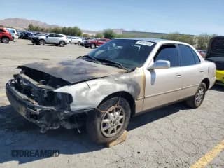 ✅ 1995 Toyota Camry LE • VIN: JT2SK12E4S0292376 • Лот: 80361575. Опубликован ранее на Copart с пробегом 283 257 миль. Бесплатный доступ к архиву аукционных продаж из США и подробный отчёт об истории автомобиля на DreamBid. Изображение 1.