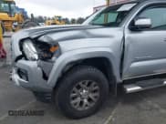 ✅ 2017 Toyota Tacoma SR • VIN: 5TFAX5GNXHX082823 • Lot: 41922495. Listed on IAAI with 57,511 mi. Free auction sales archive from the USA and detailed vehicle history report at DreamBid. Image 6.