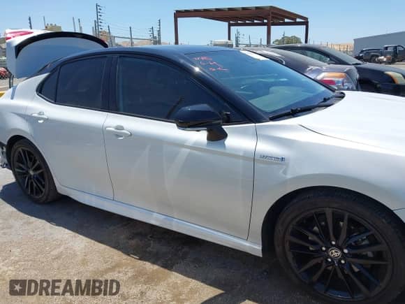 2021 Toyota Camry Hybrid XSE with VIN 4T1K31AK2MU020833, listed as a IAAI auction lot 42520233 with 86,176 mi miles and . Bid and sale history available at DreamBid. Image 13.