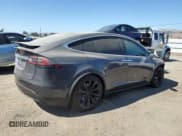 ✅ 2021 Tesla Model X Performance • VIN: 5YJXCDE42MF320839 • Lot: 63784705. Wystawiony na Copart z przebiegiem 24 760 mil. Bezpłatny archiwum sprzedaży aukcyjnych z USA i szczegółowy raport historii pojazdu na DreamBid. Zdjęcie 3.