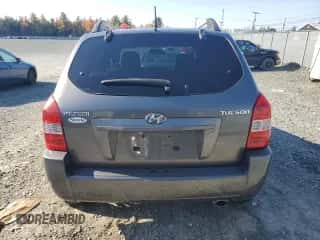 2009 Hyundai Tucson GLS z VIN KM8JM12B09U009571, wystawiony jako Copart lot #84885555 z przebiegiem 156 939 mil mil oraz Szkoda całkowita • Salvage title. Historia ofert i sprzedaży dostępna na DreamBid. Obrazek 6.