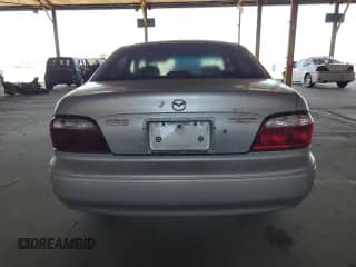 ✅ 2002 Mazda 626 LX • VIN: 1YVGF22C425273491 • Lot: 44626465. Wystawiony na Copart z przebiegiem 147 591 mil. Bezpłatny archiwum sprzedaży aukcyjnych z USA i szczegółowy raport historii pojazdu na DreamBid. Zdjęcie 6.