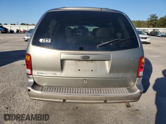 ✅ 2003 Ford Windstar SEL • VIN: 2FMDA53423BA34420 • Lot: 91514615. Wystawiony na Copart z przebiegiem 172 973 mil. Bezpłatny archiwum sprzedaży aukcyjnych z USA i szczegółowy raport historii pojazdu na DreamBid. Zdjęcie 6.