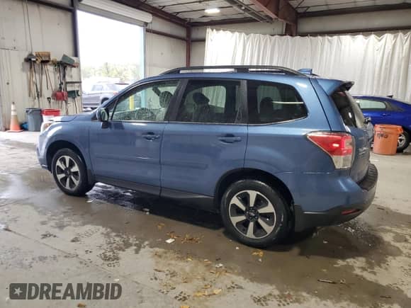 2017 Subaru Forester Limited with VIN JF2SJAJC5HH527843, listed as a Copart auction lot 82440135 with 64,197 mi miles and Salvage title. Bid and sale history available at DreamBid. Image 2.