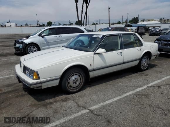✅ 1986 Oldsmobile Delta • VIN: 1G3HY6933G1811551 • Лот: 57233005. Опубликован ранее на Copart с пробегом 42 920 миль. Бесплатный доступ к архиву аукционных продаж из США и подробный отчёт об истории автомобиля на DreamBid. Изображение 1.