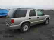 2002 Chevrolet Blazer LS z VIN 1GNDT13W02K155161, wystawiony jako Copart lot #80033774 z przebiegiem 145 425 mil mil oraz Szkoda całkowita • Salvage title. Historia ofert i sprzedaży dostępna na DreamBid. Obrazek 3.