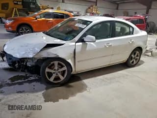 ✅ 2005 Mazda 3 i • VIN: JM1BK12F351296627 • Lot: 93817805. Listed on Copart with 352,309 mi. Free auction sales archive from the USA and detailed vehicle history report at DreamBid. Image 1.