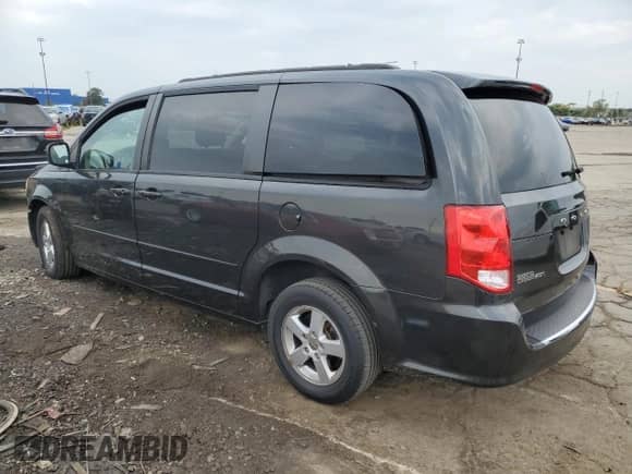 2012 Dodge Grand Caravan SXT z VIN 2C4RDGCG4CR295109, wystawiony jako Copart lot #71798585 z przebiegiem 84 778 mil mil oraz Szkoda całkowita • Salvage title. Historia ofert i sprzedaży dostępna na DreamBid. Obrazek 2.