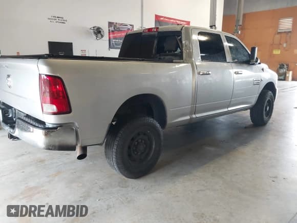 ✅ 2012 Ram 2500 SLT • VIN: 3C6UD5DL8CG180990 • Lot: 43193300. Listed on IAAI with 333,551 mi. Free auction sales archive from the USA and detailed vehicle history report at DreamBid. Image 4.