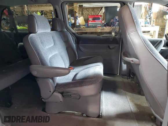 1996 Dodge Caravan SE с VIN 1B4GP44R9TB246111, выставлен на аукционе Copart как лот 49810925 с пробегом Не указан миль и Чистый • Clean title. История ставок и продаж доступна на DreamBid. Изображение 11.