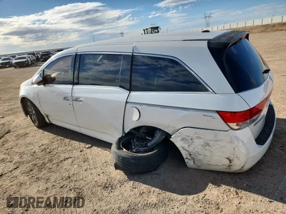 ✅ 2016 Honda Odyssey Touring Elite • VIN: 5FNRL5H90GB031517 • Lot: 87404655. Listed on Copart with 131,680 mi. Free auction sales archive from the USA and detailed vehicle history report at DreamBid. Image 2.