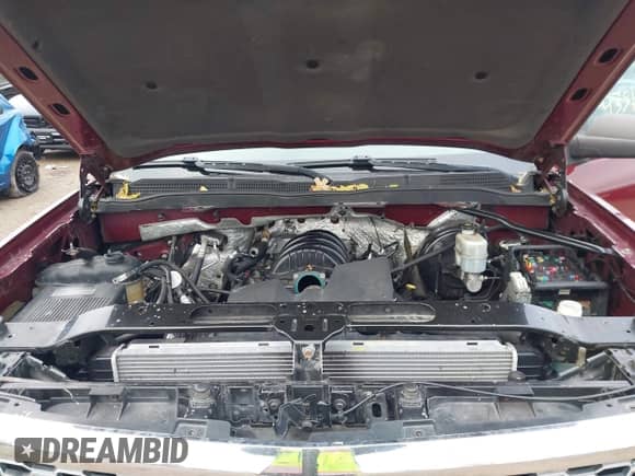 2014 Chevrolet Silverado 1500 LT z VIN 1GCRCREH1EZ403294, wystawiony jako IAAI lot #43519990 z przebiegiem 229 946 mil mil oraz . Historia ofert i sprzedaży dostępna na DreamBid. Obrazek 10.