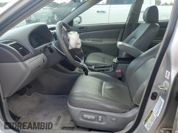 ✅ 2004 Toyota Camry LE • VIN: 4T1BF32K04U063097 • Lot: 70932064. Wystawiony na Copart z przebiegiem 178 393 mil. Bezpłatny archiwum sprzedaży aukcyjnych z USA i szczegółowy raport historii pojazdu na DreamBid. Zdjęcie 7.