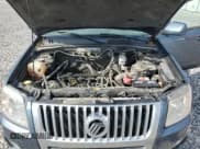 ✅ 2011 Mercury Mariner Premier • VIN: 4M2CN8H74BKJ01686 • Лот: 81103315. Опубликован ранее на Copart с пробегом 162 003 миль. Бесплатный доступ к архиву аукционных продаж из США и подробный отчёт об истории автомобиля на DreamBid. Изображение 12.