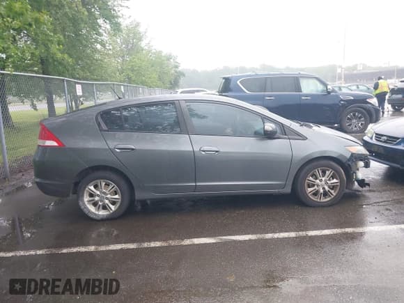 ✅ 2010 Honda Insight EX • VIN: JHMZE2H76AS010087 • Lot: 42324827. Listed on IAAI with 120,737 mi. Free auction sales archive from the USA and detailed vehicle history report at DreamBid. Image 13.