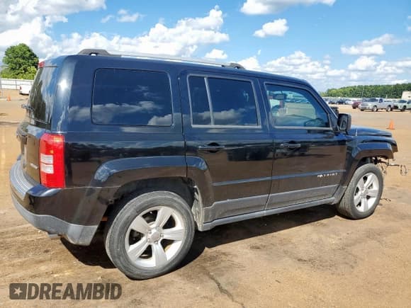 ✅ 2015 Jeep Patriot Limited • VIN: 1C4NJPCB1FD179594 • Lot: 83816695. Listed on Copart with 82,717 mi. Free auction sales archive from the USA and detailed vehicle history report at DreamBid. Image 3.