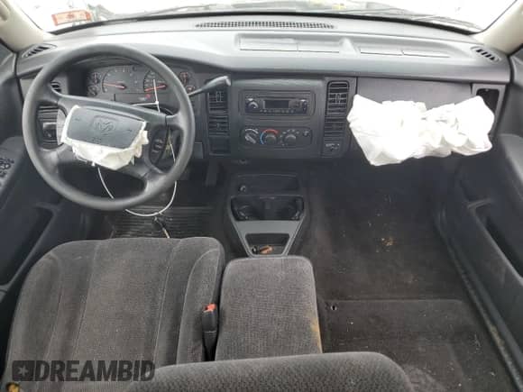 2003 Dodge Dakota SLT with VIN 1D7HL42X93S256342, listed as a Copart auction lot 80322324 with 105,049 mi miles and Salvage title. Bid and sale history available at DreamBid. Image 8.