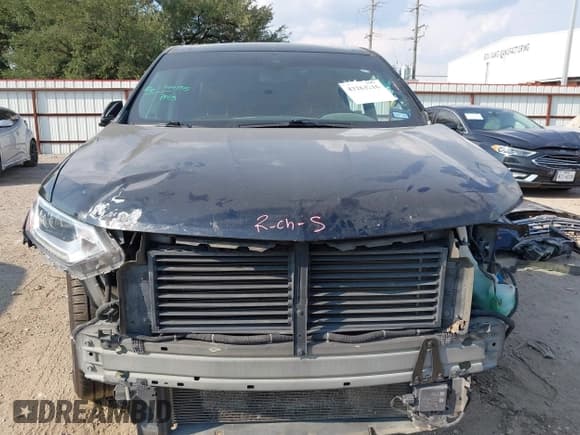 ✅ 2019 Chevrolet Traverse RS • VIN: 1GNEVJKW7KJ135365 • Lot: 43263216. Listed on IAAI with 125,648 mi. Free auction sales archive from the USA and detailed vehicle history report at DreamBid. Image 13.