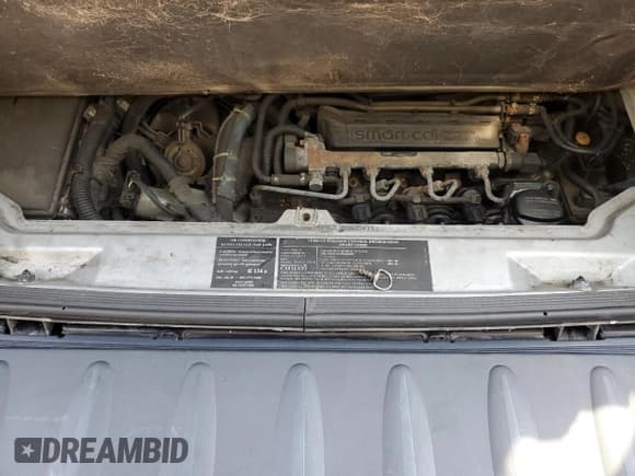 ✅ 2006 Smart fortwo • VIN: WMEAJ00F56J262624 • Лот: 67174405. Опубликован ранее на Copart с пробегом 125 366 миль. Бесплатный доступ к архиву аукционных продаж из США и подробный отчёт об истории автомобиля на DreamBid. Изображение 11.