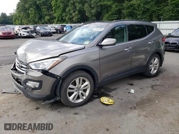 ✅ 2015 Hyundai Santa Fe • VIN: 5XYZW4LA3FG240521 • Лот: 62567603. Опубликован ранее на Copart с пробегом 89 243 миль. Бесплатный доступ к архиву аукционных продаж из США и подробный отчёт об истории автомобиля на DreamBid. Изображение 1.
