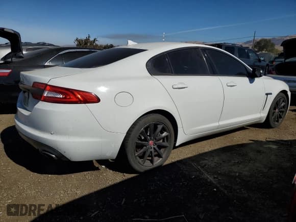 ✅ 2014 Jaguar XF T • VIN: SAJWA0ES3EPU24208 • Лот: 74617464. Опубликован ранее на Copart с пробегом 128 874 миль. Бесплатный доступ к архиву аукционных продаж из США и подробный отчёт об истории автомобиля на DreamBid. Изображение 3.