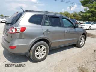 2012 Hyundai Santa Fe GLS с VIN 5XYZGDAB9CG114426, выставлен на аукционе Copart как лот 69819974 с пробегом 233 854 миль миль и Чистый • Clean title. История ставок и продаж доступна на DreamBid. Изображение 3.
