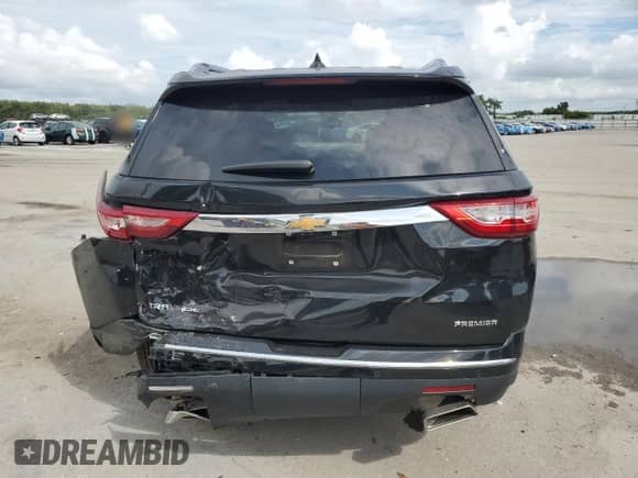 2021 Chevrolet Traverse Premier с VIN 1GNERKKW4MJ146479, выставлен на аукционе Copart как лот 70419845 с пробегом 35 468 миль миль и Списание • Salvage title. История ставок и продаж доступна на DreamBid. Изображение 6.