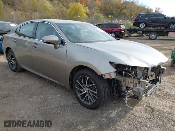 ✅ 2016 Lexus ES 330 • VIN: 58ABK1GG5GU018836 • Lot: 43635193. Listed on IAAI with 37,600 mi. Free auction sales archive from the USA and detailed vehicle history report at DreamBid. Image 1.