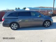 ✅ 2012 Honda Odyssey Touring • VIN: 5FNRL5H93CB037791 • Лот: 43678831. Опубликован ранее на IAAI с пробегом 241 470 миль. Бесплатный доступ к архиву аукционных продаж из США и подробный отчёт об истории автомобиля на DreamBid. Изображение 14.