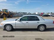 ✅ 2001 Ford Crown Victoria • VIN: 2FAFP73W31X139188 • Lot: 41883697. Listed on IAAI with 142,744 mi. Free auction sales archive from the USA and detailed vehicle history report at DreamBid. Image 15.