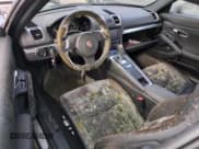 ✅ 2014 Porsche Cayman • VIN: WP0AA2A82EK170311 • Лот: 76123574. Опубликован ранее на Copart с пробегом Не указан. Бесплатный доступ к архиву аукционных продаж из США и подробный отчёт об истории автомобиля на DreamBid. Изображение 8.