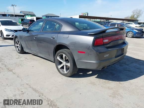2014 Dodge Charger SXT with VIN 2C3CDXHG2EH256675, listed as a IAAI auction lot 41278616 with 139,709 mi miles and . Bid and sale history available at DreamBid. Image 3.