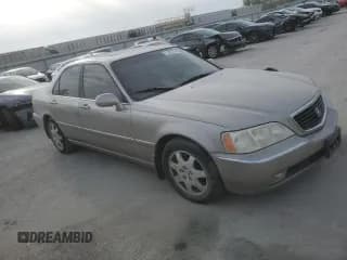 ✅ 2002 Acura RL • VIN: JH4KA96532C008414 • Лот: 71397774. Опубликован ранее на Copart с пробегом 176 293 миль. Бесплатный доступ к архиву аукционных продаж из США и подробный отчёт об истории автомобиля на DreamBid. Изображение 4.