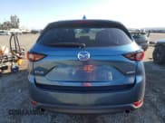 ✅ 2021 Mazda CX-5 Touring • VIN: JM3KFACMXM0445631 • Lot: 82556965. Wystawiony na Copart z przebiegiem 39 563 mil. Bezpłatny archiwum sprzedaży aukcyjnych z USA i szczegółowy raport historii pojazdu na DreamBid. Zdjęcie 6.