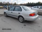 ✅ 2000 Chevrolet Prizm • VIN: 1Y1SK5281YZ411235 • Lot: 43719764. Listed on IAAI with 96,400 mi. Free auction sales archive from the USA and detailed vehicle history report at DreamBid. Image 3.