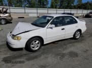 ✅ 1999 Toyota Corolla LE • VIN: 2T1BR12E0XC125030 • Lot: 70889145. Listed on Copart with 153,923 mi. Free auction sales archive from the USA and detailed vehicle history report at DreamBid. Image 1.