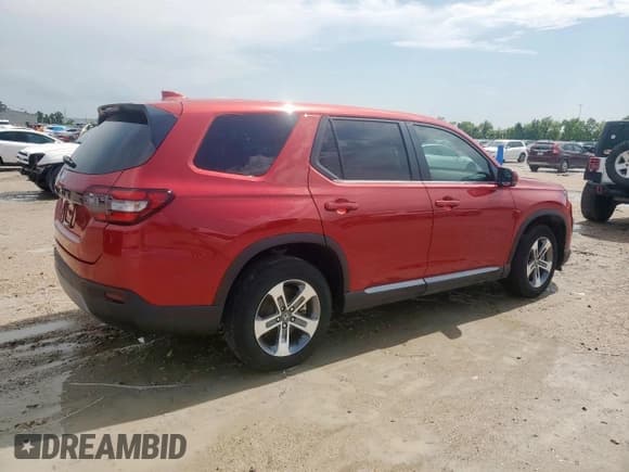 ✅ 2023 Honda Pilot EX-L • VIN: 5FNYG1H57PB019242 • Лот: 59748045. Опубликован ранее на Copart с пробегом 23 270 миль. Бесплатный доступ к архиву аукционных продаж из США и подробный отчёт об истории автомобиля на DreamBid. Изображение 3.